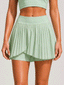 Avrane Maisie Pleated Skort - women's asymmetrical layered pleated tennis skort in green