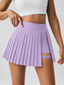 Avrane Lila Court Skort - women's structured pleated tennis skort with garter strap in purple