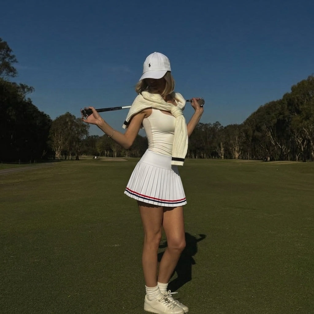80s Golf Outfit Ideas: How To Style A Tennis-Inspired Skirt For A Retro Sporty Look