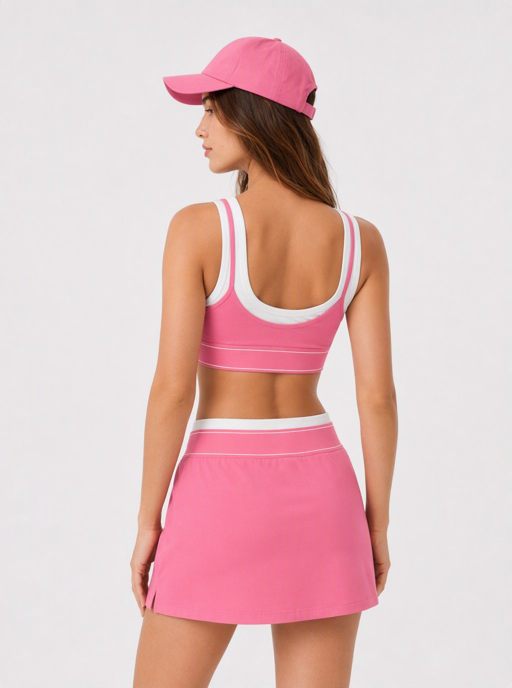 Avrane The Cora pink layered sports bra and A-line court skirt set with white contrast trim