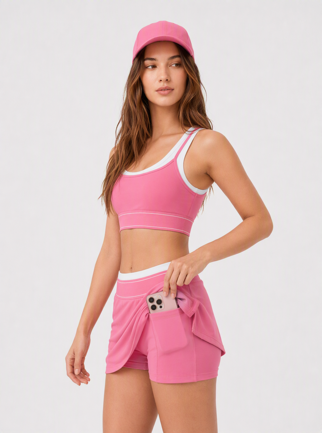 Avrane The Cora pink layered sports bra and A-line court skirt set with white contrast trim