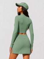 Avrane The Elara green half-zip long-sleeve top and side-slit court skirt set