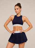 Avrane The Lucienne Pleated Skort - women's contrast-waist pleated court skort