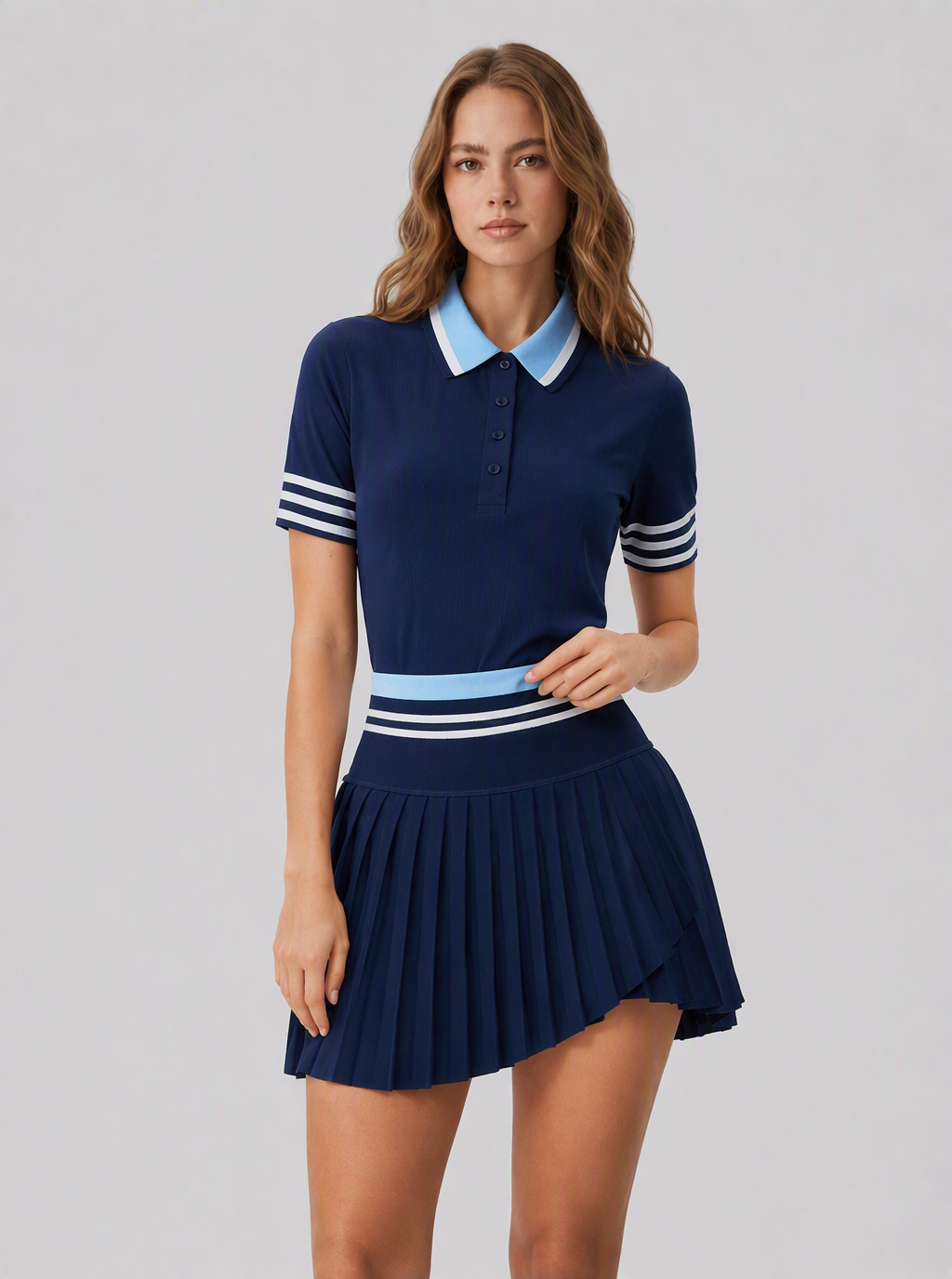 Avrane The Blair navy pleated performance skort with light blue contrast waistband