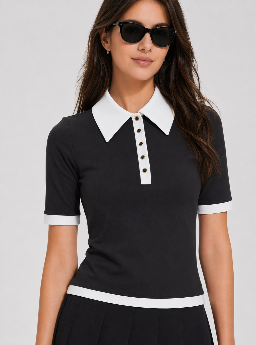 Avrane Piper Polo Top - women's contrast-trim polo with pointed collar in black Main image