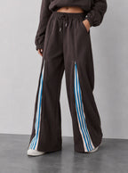 Avrane The Nova coffee zip jacket and wide-leg track pants with blue striped inset panels