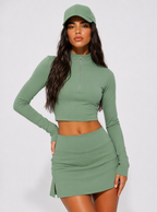 Avrane The Elara green half-zip long-sleeve top and side-slit court skirt set